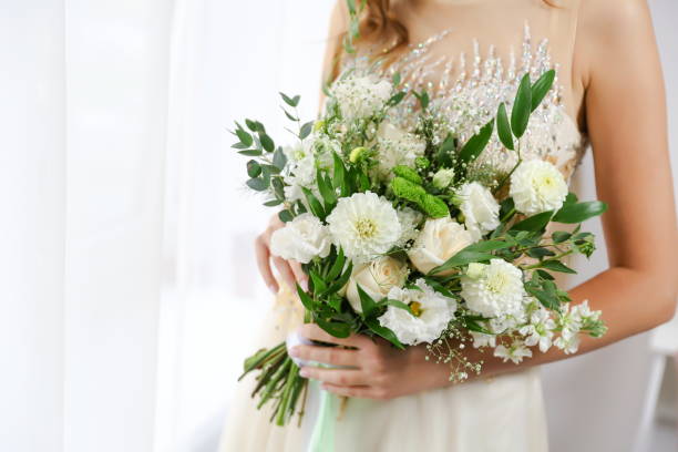 istock bride holding wedding bouquet close-up. 1343549381