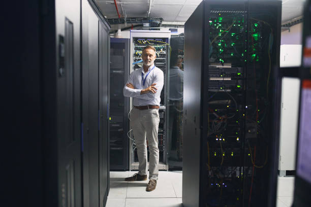 istock Portrait of a mature man working in a server room 1343550839