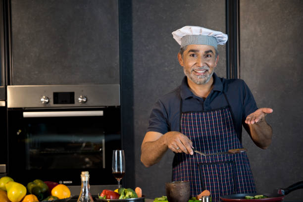 istock Chef tasting food and showing ok sign 1343560529