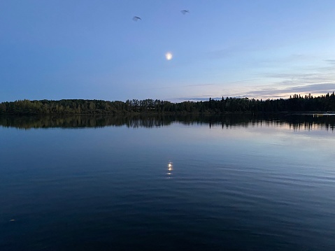 Landscapes along Pine Lake at dusk in rural Alberta