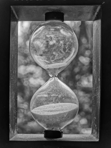istock B&W photo of An hourglass Sand Time Clock Timer 1343566718