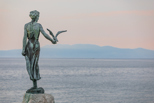statue at the beach of opatija city in croatia summer vacation tourist landmark