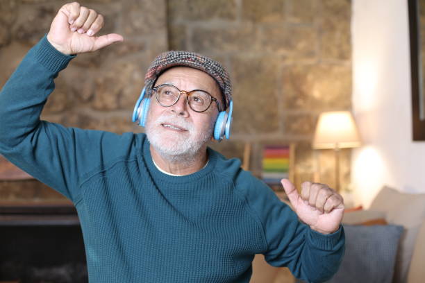 istock Active senior man dancing to music 1343574039