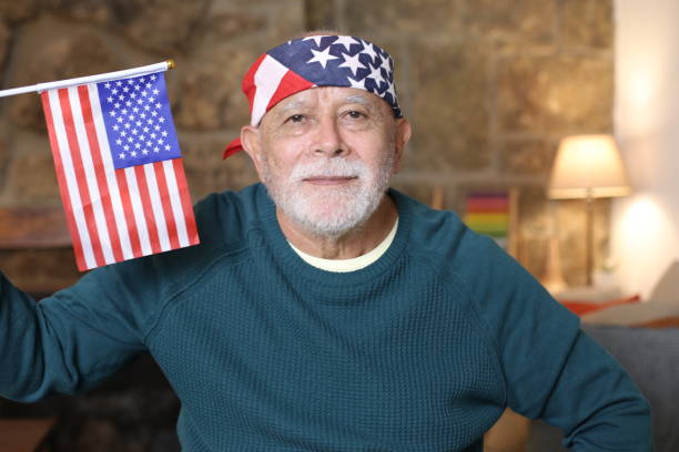 istock Elder American citizen waving the national flag 1343574205