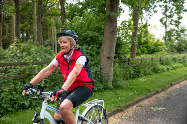 istock Active Woman Cycling in the Countryside 1343576640