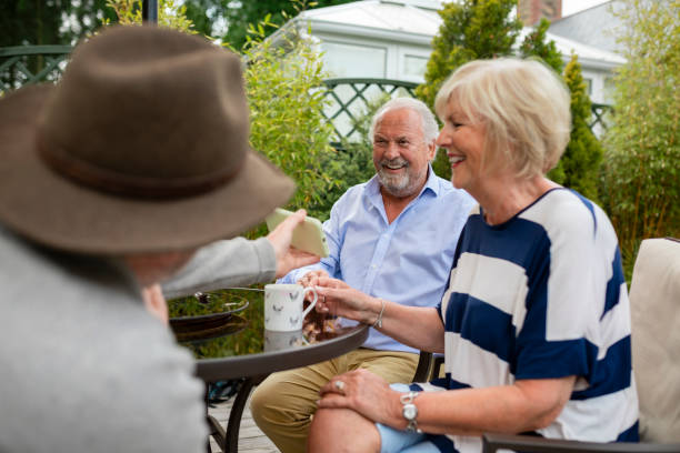 istock Friends Having a Laugh in the Garden 1343576789