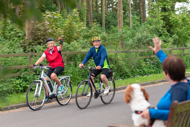 Couple Cycling Through Town