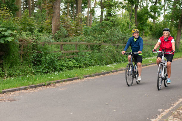 istock Couple Cycling in the Countryside 1343576968