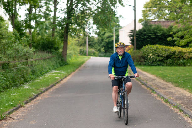 istock Senior Man Cycling in the Countryside 1343576979