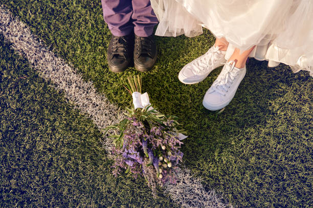 Couple standing on the grass