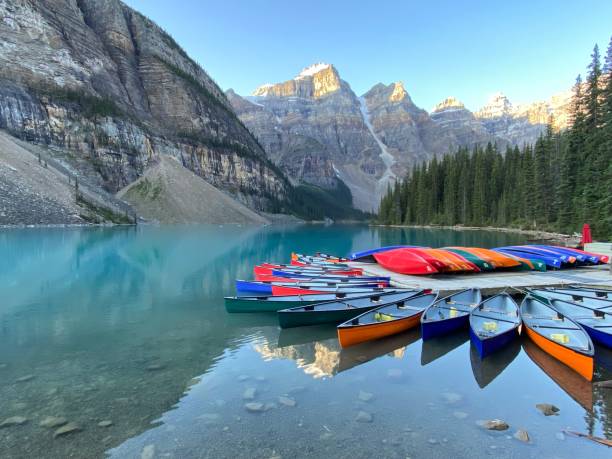 istock Moraine lake canoes at dawn 1343585914