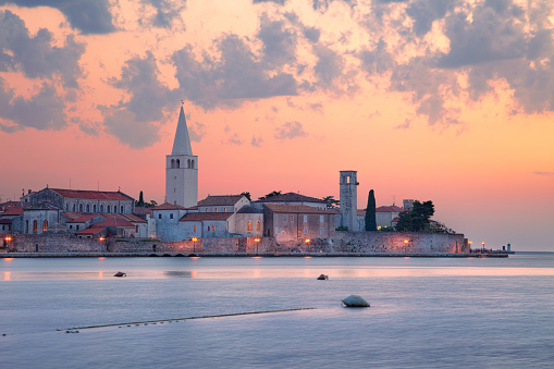 Cityscape image of Porec, Croatia with the Euphrasian Basilica located on Istrian Peninsula at summer sunset.