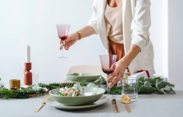 istock Christmas Celebration: An Anonymous Woman Setting Up Christmas Dinner Table 1343587127