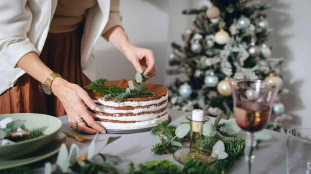 istock New Year's Eve Preparations: An Anonymous Woman Setting Up Christmas Dinner Table 1343587187