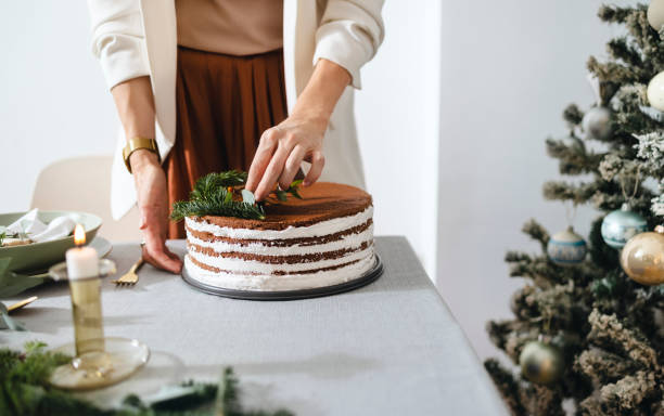 istock New Year's Eve Preparations: An Anonymous Woman Setting Up Christmas Dinner Table 1343587192