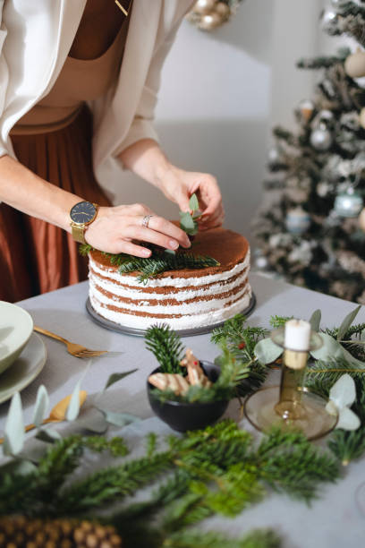 istock New Year's Eve Preparations: An Anonymous Woman Setting Up Christmas Dinner Table 1343587193