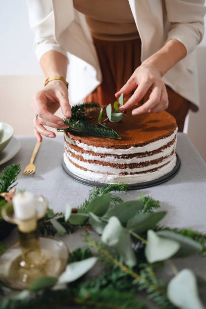istock New Year's Eve Preparations: An Anonymous Woman Setting Up Christmas Dinner Table 1343587198