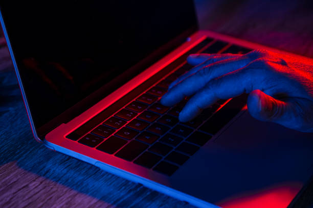 istock Close up of man's hand on laptop 1343588501