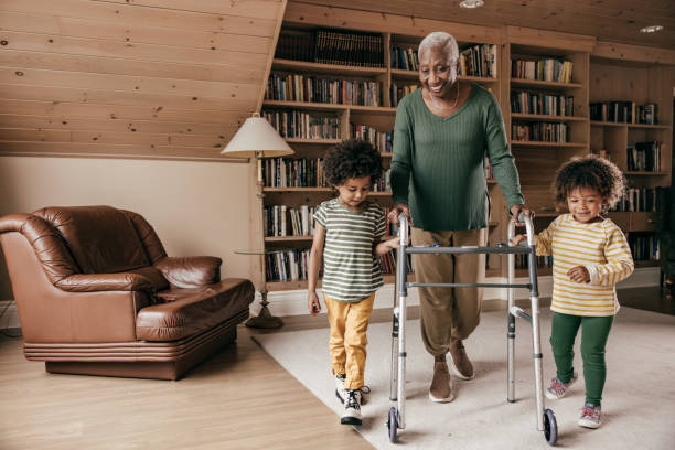 istock Granny walking with grandkids help 1343591248