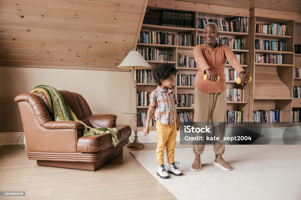 Motivating grandkids Granny and her grandson 4-5 Years Stock Photo
