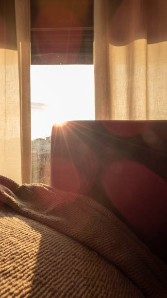 istock looking at a new day from the window 1343592810