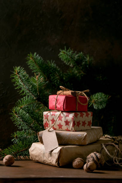 istock Collection of Christmas gift boxes in craft paper 1343595575