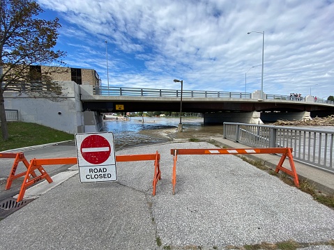 Road closed due to flooding of a river