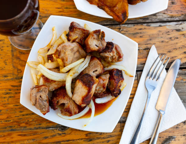 istock Grilled pork meat shashlik with sliced onion 1343599657