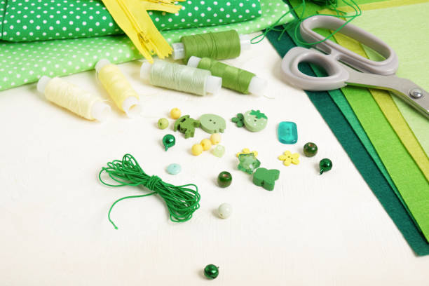 istock accessories for sewing and needlework on the table beads buttons and pins 1343600490