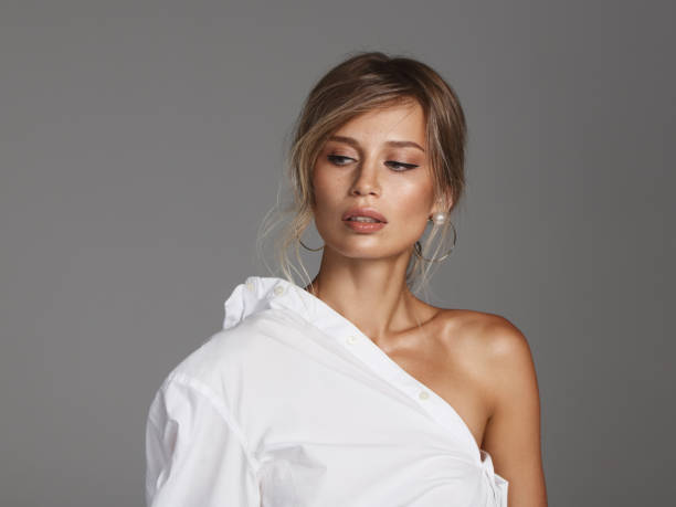 istock Beautiful woman wearing white top 1343600734