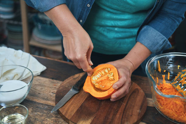 istock Preparing Fresh Pumpkins for Roasting in the Oven 1343603017