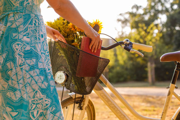 istock Packing a book in a bike basket after reading and reading 1343603823