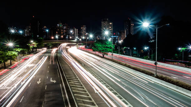 istock freeway in Sao Paulo city at night, long exposure, light trails. 1343608073