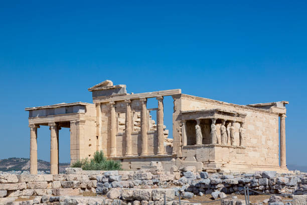 istock Ancient Erechtheion or Erechtheum temple with Caryatid Porch on the Acropolis, Athens, Greece. World famous landmark at the Acropolis Hill. 1343612457