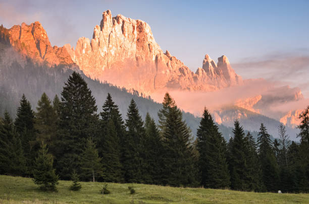 istock Majestic mountain peak glowing in sunset light in autumn 1343612854