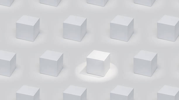 istock An outstanding white cubic podium in accent lighting among podiums in the same lighting 1343617266