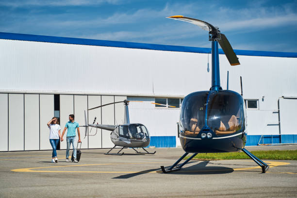 istock Happy Caucasian tourist couple moving towards empty chopper 1343617280