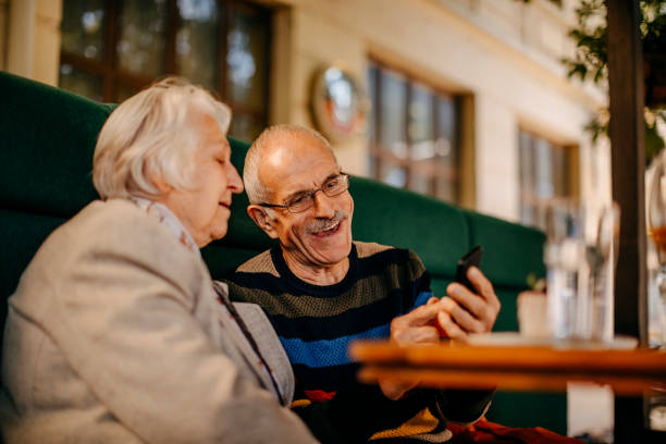 istock Old couple in restaurant 1343618911