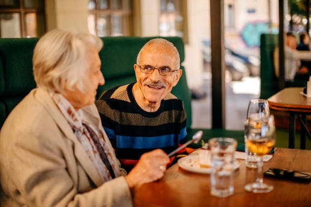 istock Old couple in restaurant 1343618951