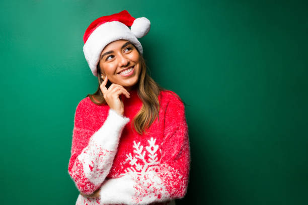 istock Woman dreaming about christmas presents 1343619543