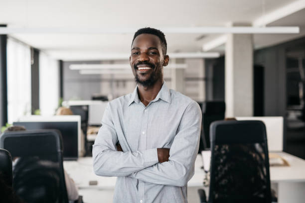 istock Young businessman enjoying life in a modern office 1343619836