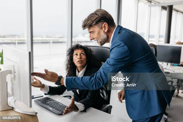 Business Woman And Businessman Having A Heated Discussion Stock Photo - Download Image Now