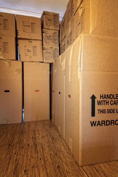 istock Moving boxes in a residential house 1343625676