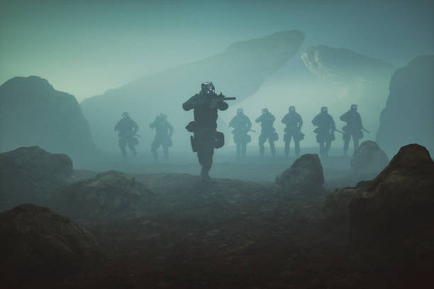 岩場を歩く未来的な兵士 - commando ストックフォトと画像