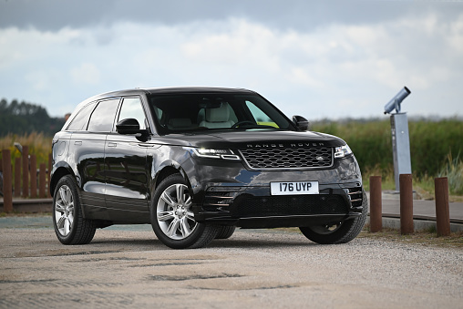 Usedom, Germany - 2nd August, 2021: Range Rover Velar on a road. This vehicle is a popular medium-size SUV in Europe.