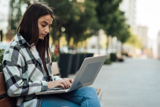 istock Girl chat on laptop 1343632131