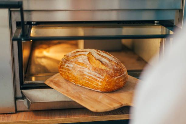 istock Woman Making Bread from the Oven 1343633431