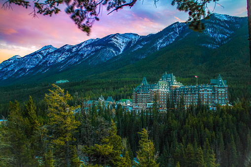 Sunset over the Fairmont Banff Springs hotel, taken in winter of 2019 from the Surprise Corner. Designed by 	Bruce Price
Walter Painter and John Orrock