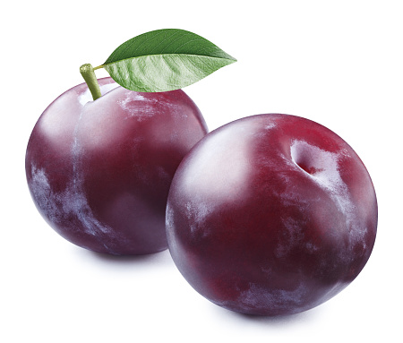 Delicious ripe plums on white