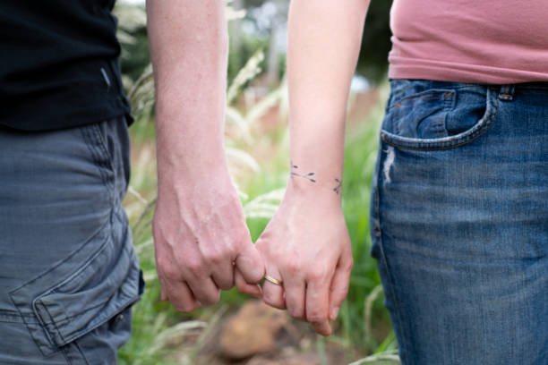 istock Couple walking hand in hand. 1343635958